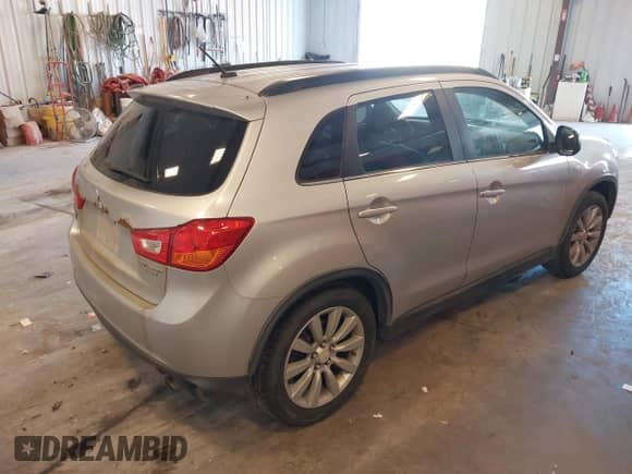 2013 Mitsubishi Outlander LE z VIN 4A4AR5AU1DE024530, wystawiony jako IAAI lot #43578980 z przebiegiem 230 778 mil mil oraz . Historia ofert i sprzedaży dostępna na DreamBid. Obrazek 4.