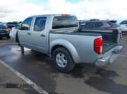 ✅ 2005 Nissan Frontier LE • VIN: 1N6AD07U05C463681 • Lot: 43757506. Listed on IAAI with 184,377 mi. Free auction sales archive from the USA and detailed vehicle history report at DreamBid. Image 3.