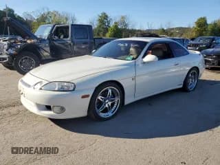 ✅ 1999 Lexus SC 400 • VIN: JT8CH32Y6X1002865 • Lot: 82233355. Listed on Copart with 387,574 mi. Free auction sales archive from the USA and detailed vehicle history report at DreamBid. Image 1.