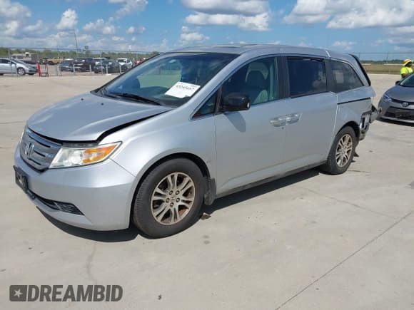 ✅ 2012 Honda Odyssey EX-L • VIN: 5FNRL5H67CB060884 • Lot: 43245657. Wystawiony na IAAI z przebiegiem 145 552 mil. Bezpłatny archiwum sprzedaży aukcyjnych z USA i szczegółowy raport historii pojazdu na DreamBid. Zdjęcie 2.