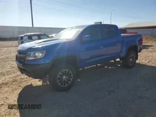 ✅ 2019 Chevrolet Colorado 4WD ZR2 • VIN: 1GCGTEEN2K1107099 • Lot: 89635805. Listed on Copart with 94,976 mi. Free auction sales archive from the USA and detailed vehicle history report at DreamBid. Image 1.