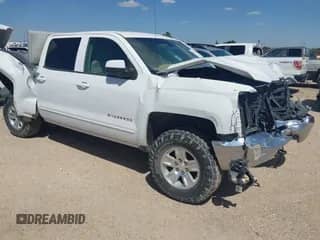 2018 Chevrolet Silverado 1500 LT z VIN 3GCUKREC9JG274331, wystawiony jako IAAI lot #42785716 z przebiegiem Nie podano mil oraz . Historia ofert i sprzedaży dostępna na DreamBid. Obrazek 1.