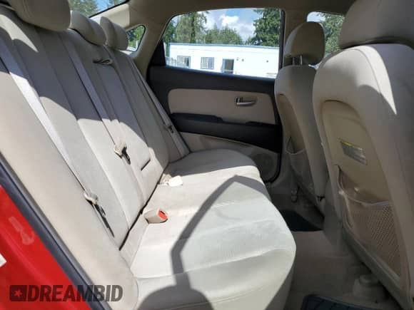 2007 Hyundai Elantra GLS z VIN KMHDU46D77U087613, wystawiony jako Copart lot #71460054 z przebiegiem 73 669 mil mil oraz Szkoda całkowita • Salvage title. Historia ofert i sprzedaży dostępna na DreamBid. Obrazek 10.