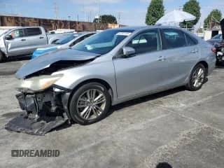 2015 Toyota Camry SE с VIN 4T1BF1FK2FU879374, выставлен на аукционе Copart как лот 82293135 с пробегом 173 247 миль миль и Списание • Salvage title. История ставок и продаж доступна на DreamBid. Изображение 1.