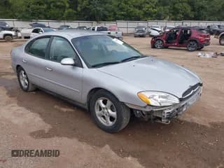 ✅ 2003 Ford Taurus SE Standard • VIN: 1FAFP53U43A119272 • Lot: 43269838. Listed on IAAI with 168,335 mi. Free auction sales archive from the USA and detailed vehicle history report at DreamBid. Image 1.
