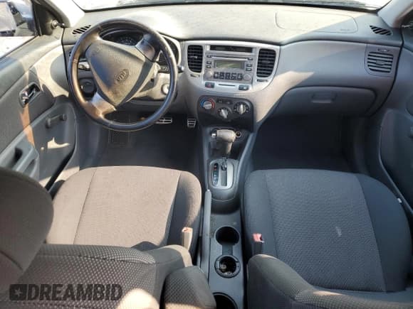 ✅ 2006 Kia Rio SX • VIN: KNADE163466095756 • Лот: 80091425. Опубликован ранее на Copart с пробегом 99 289 миль. Бесплатный доступ к архиву аукционных продаж из США и подробный отчёт об истории автомобиля на DreamBid. Изображение 8.