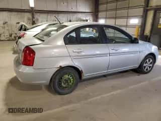 2009 Hyundai Accent Auto GLS z VIN KMHCN46C99U306008, wystawiony jako Copart lot #74152544 z przebiegiem 124 576 mil mil oraz Szkoda całkowita • Salvage title. Historia ofert i sprzedaży dostępna na DreamBid. Obrazek 3.