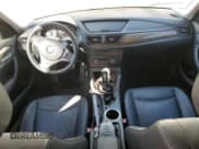 ✅ 2013 BMW X1 28i • VIN: WBAVM1C54DVL64127 • Лот: 92442935. Опубликован ранее на Copart с пробегом Не указан. Бесплатный доступ к архиву аукционных продаж из США и подробный отчёт об истории автомобиля на DreamBid. Изображение 8.