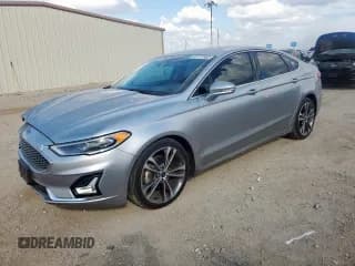 ✅ 2020 Ford Fusion Titanium • VIN: 3FA6P0D99LR117309 • Lot: 85727865. Listed on Copart with 87,223 mi. Free auction sales archive from the USA and detailed vehicle history report at DreamBid. Image 1.
