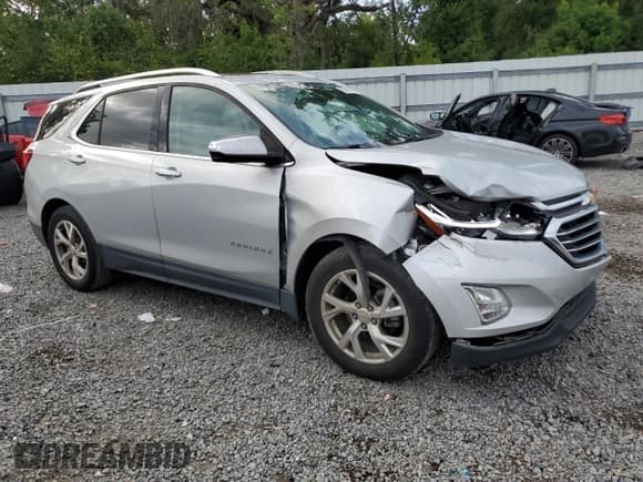 ✅ 2020 Chevrolet Equinox Premier • VIN: 2GNAXNEV1L6249377 • Lot: 83957145. Wystawiony na Copart z przebiegiem 171 156 mil. Bezpłatny archiwum sprzedaży aukcyjnych z USA i szczegółowy raport historii pojazdu na DreamBid. Zdjęcie 4.
