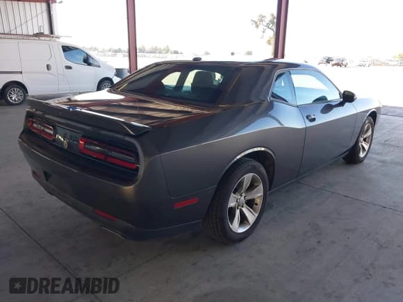 ✅ 2021 Dodge Challenger SXT • VIN: 2C3CDZAG0MH542643 • Lot: 43398277. Listed on IAAI with 77,098 mi. Free auction sales archive from the USA and detailed vehicle history report at DreamBid. Image 4.
