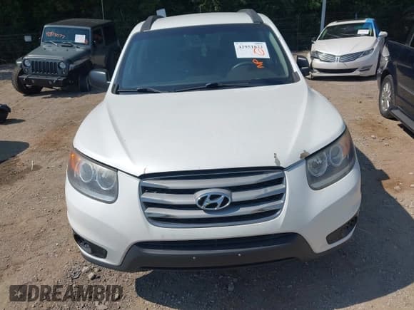 ✅ 2012 Hyundai Santa Fe GLS • VIN: 5XYZGDAG6CG117330 • Lot: 42951822. Listed on IAAI with 124,187 mi. Free auction sales archive from the USA and detailed vehicle history report at DreamBid. Image 6.