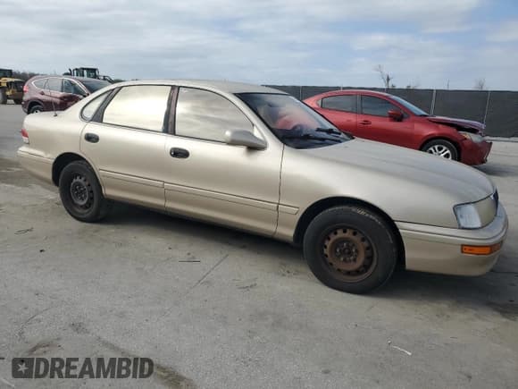✅ 1995 Toyota Avalon XL • VIN: 4T1GB10E9SU055662 • Lot: 46490495. Listed on Copart with 326,037 mi. Free auction sales archive from the USA and detailed vehicle history report at DreamBid. Image 4.