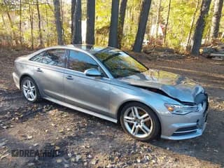 ✅ 2016 Audi A6 Premium Plus • VIN: WAUGFAFC9GN021296 • Lot: 43586356. Listed on IAAI with 106,015 mi. Free auction sales archive from the USA and detailed vehicle history report at DreamBid. Image 1.