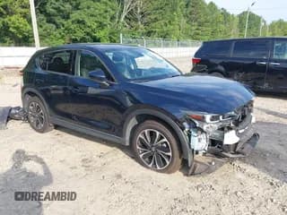 ✅ 2022 Mazda CX-5 S Premium Plus • VIN: JM3KFBEMXN1537398 • Lot: 42578948. Wystawiony na IAAI z przebiegiem 61 592 mil. Bezpłatny archiwum sprzedaży aukcyjnych z USA i szczegółowy raport historii pojazdu na DreamBid. Zdjęcie 1.