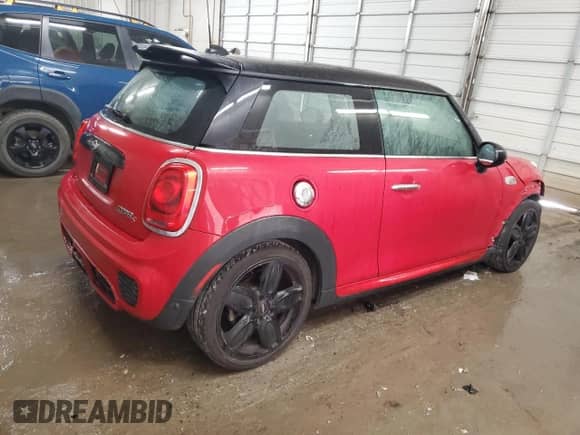 2015 MINI Hardtop S with VIN WMWXP7C59F2C60260, listed as a Copart auction lot 57678335 with 71,077 mi miles and Salvage title. Bid and sale history available at DreamBid. Image 3.