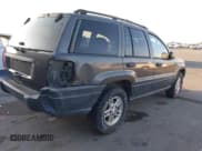 ✅ 2003 Jeep Grand Cherokee Laredo • VIN: 1J4GW48S03C595326 • Lot: 43837212. Listed on IAAI with Not provided. Free auction sales archive from the USA and detailed vehicle history report at DreamBid. Image 4.