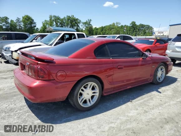 ✅ 1998 Ford Mustang GT • VIN: 1FAFP42X2WF169410 • Lot: 57450275. Listed on Copart with 196,606 mi. Free auction sales archive from the USA and detailed vehicle history report at DreamBid. Image 3.