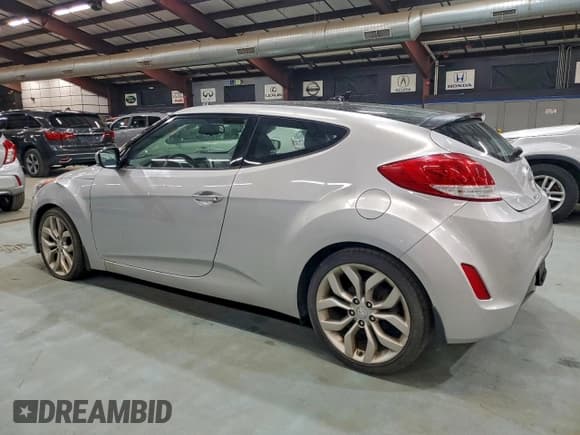 ✅ 2013 Hyundai Veloster RE:MIX • VIN: KMHTC6AD9DU094219 • Lot: 94671065. Listed on Copart with 148,217 mi. Free auction sales archive from the USA and detailed vehicle history report at DreamBid. Image 2.