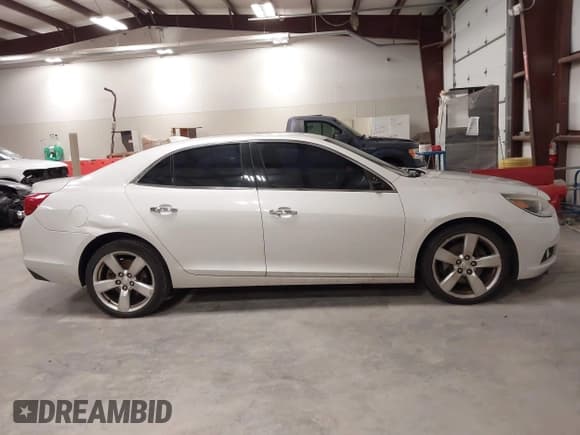 ✅ 2015 Chevrolet Malibu LTZ • VIN: 1G11G5SX1FF128902 • Lot: 43594997. Listed on IAAI with 105,886 mi. Free auction sales archive from the USA and detailed vehicle history report at DreamBid. Image 13.