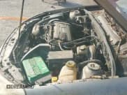 ✅ 2003 Saturn LS • VIN: 1G8JU54FX3Y556207 • Lot: 43731223. Listed on IAAI with 129,019 mi. Free auction sales archive from the USA and detailed vehicle history report at DreamBid. Image 12.