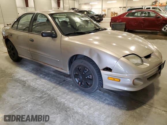 ✅ 2001 Pontiac Sunfire SE • VIN: 1G2JB524017181271 • Lot: 71669465. Wystawiony na Copart z przebiegiem 185 406 mil. Bezpłatny archiwum sprzedaży aukcyjnych z USA i szczegółowy raport historii pojazdu na DreamBid. Zdjęcie 4.
