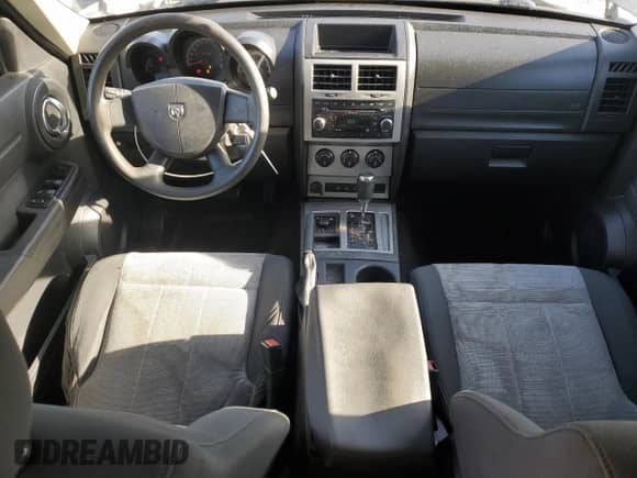 2008 Dodge Nitro SXT с VIN 1D8GU28K38W128408, выставлен на аукционе Copart как лот 82623454 с пробегом 137 886 миль миль и Чистый • Clean title. История ставок и продаж доступна на DreamBid. Изображение 8.