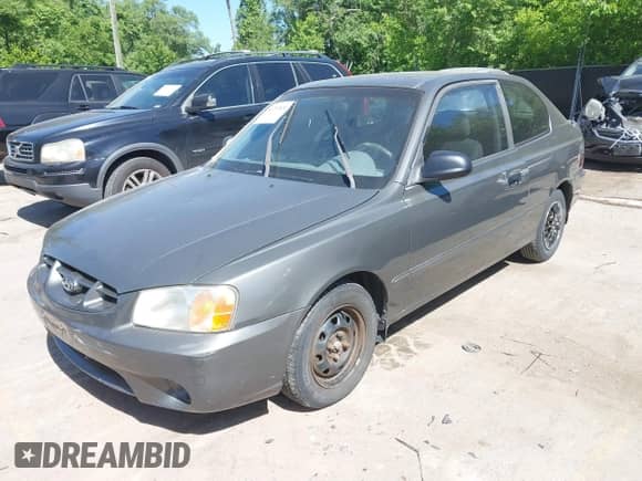 2001 Hyundai Accent GS z VIN KMHCG35C01U136132, wystawiony jako IAAI lot #42293830 z przebiegiem 111 906 mil mil oraz . Historia ofert i sprzedaży dostępna na DreamBid. Obrazek 2.