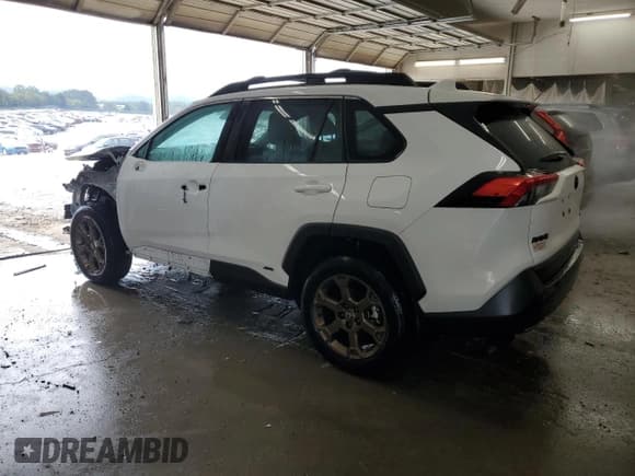 ✅ 2023 Toyota RAV4 Hybrid Woodland • VIN: 2T3UWRFV6PW151275 • Лот: 84451825. Опубликован ранее на Copart с пробегом 71 713 миль. Бесплатный доступ к архиву аукционных продаж из США и подробный отчёт об истории автомобиля на DreamBid. Изображение 2.