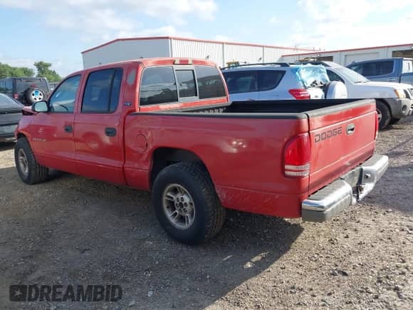✅ 2000 Dodge Dakota Sport • VIN: 1B7GL2AN0YS705134 • Лот: 41997957. Размещён на IAAI с пробегом 219 659 миль миль. Получите бесплатный доступ к архиву аукционных продаж из США и посмотрите подробный отчёт об истории автомобиля на DreamBid. Изображение 3.