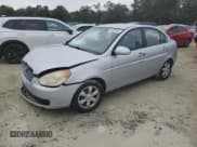 ✅ 2006 Hyundai Accent GLS • VIN: KMHCN46C06U047601 • Лот: 41873365. Опубликован ранее на Copart с пробегом 163 812 миль. Бесплатный доступ к архиву аукционных продаж из США и подробный отчёт об истории автомобиля на DreamBid. Изображение 1.