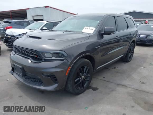 2021 Dodge Durango R/T with VIN 1C4SDJCT1MC820407, listed as a IAAI auction lot 42028410 with 75,435 mi miles and . Bid and sale history available at DreamBid. Image 2.