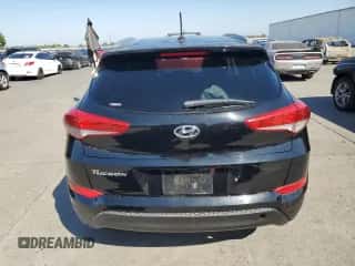 2016 Hyundai Tucson SE with VIN KM8J33A44GU141151, listed as a Copart auction lot 84209875 with 153,389 mi miles and Clean title. Bid and sale history available at DreamBid. Image 6.