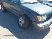 ✅ 1999 Toyota Tacoma • VIN: 4TAWN72N7XZ490080 • Lot: 42550447. Listed on IAAI with 295,096 mi. Free auction sales archive from the USA and detailed vehicle history report at DreamBid. Image 6.