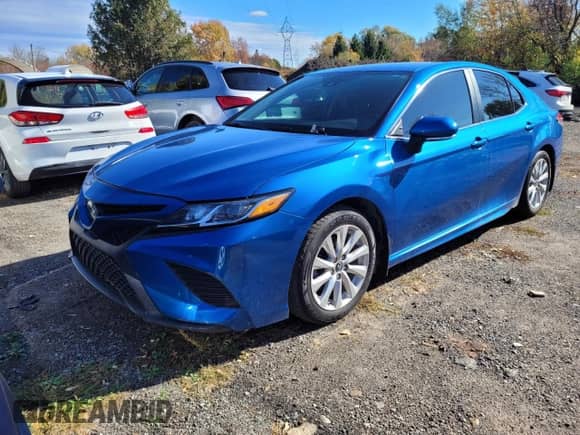 2019 Toyota Camry LE z VIN 4T1B11HK4KU272754, wystawiony jako Copart lot #89677255 z przebiegiem 148 423 mil mil oraz Czysty tytuł • Clean title. Historia ofert i sprzedaży dostępna na DreamBid. Obrazek 2.
