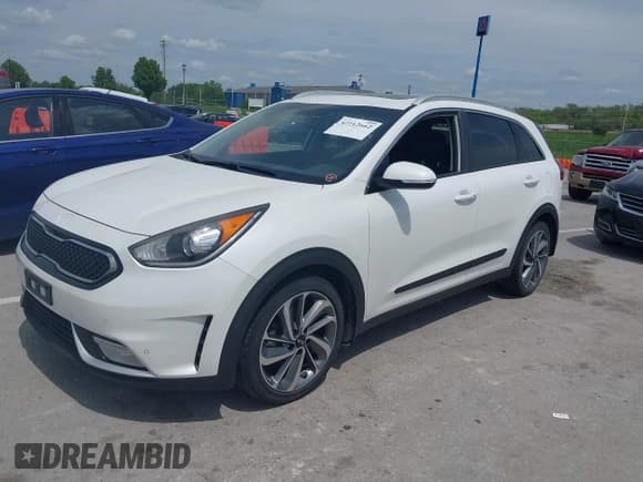 ✅ 2017 Kia Niro Touring • VIN: KNDCE3LC7H5061074 • Lot: 42112662. Listed on IAAI with 159,714 mi. Free auction sales archive from the USA and detailed vehicle history report at DreamBid. Image 2.
