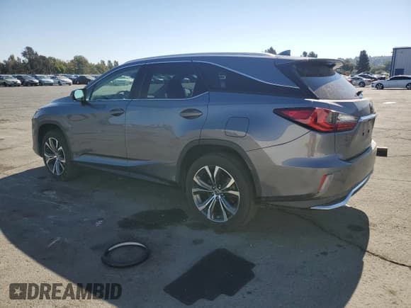 ✅ 2021 Lexus RX 350L • VIN: JTJHZKFA0M2028148 • Лот: 81299425. Опубликован ранее на Copart с пробегом 61 709 миль. Бесплатный доступ к архиву аукционных продаж из США и подробный отчёт об истории автомобиля на DreamBid. Изображение 2.