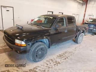 ✅ 2003 Dodge Dakota Sport • VIN: 1D7HG38N03S144856 • Lot: 41842049. Wystawiony na IAAI z przebiegiem 162 788 mil. Bezpłatny archiwum sprzedaży aukcyjnych z USA i szczegółowy raport historii pojazdu na DreamBid. Zdjęcie 2.