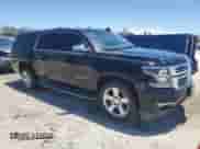 2015 Chevrolet Suburban LTZ z VIN 1GNSCKKC5FR552981, wystawiony jako Copart lot #62795914 z przebiegiem 142 590 mil mil oraz Szkoda całkowita • Salvage title. Historia ofert i sprzedaży dostępna na DreamBid. Obrazek 4.