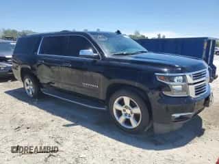 2015 Chevrolet Suburban LTZ z VIN 1GNSCKKC5FR552981, wystawiony jako Copart lot #62795914 z przebiegiem 142 590 mil mil oraz Szkoda całkowita • Salvage title. Historia ofert i sprzedaży dostępna na DreamBid. Obrazek 4.
