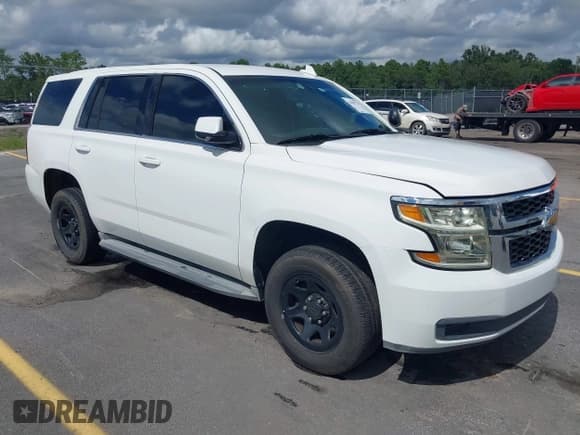 ✅ 2015 Chevrolet Tahoe Commercial • VIN: 1GNLC2EC4FR590301 • Lot: 43005734. Listed on IAAI with 208,347 mi. Free auction sales archive from the USA and detailed vehicle history report at DreamBid. Image 1.