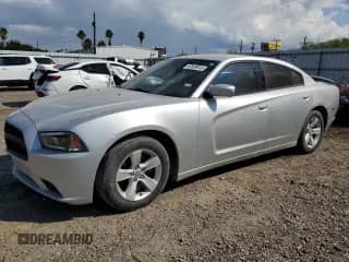 ✅ 2012 Dodge Charger SE • VIN: 2C3CDXBG6CH202916 • Lot: 82659015. Listed on Copart with 236,826 mi. Free auction sales archive from the USA and detailed vehicle history report at DreamBid. Image 1.