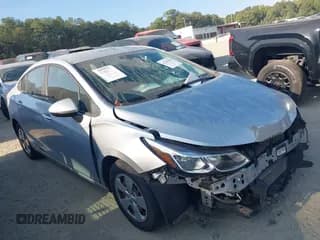 ✅ 2018 Chevrolet Cruze LS • VIN: 1G1BC5SM5J7189193 • Lot: 43296966. Listed on IAAI with 103,096 mi. Free auction sales archive from the USA and detailed vehicle history report at DreamBid. Image 1.