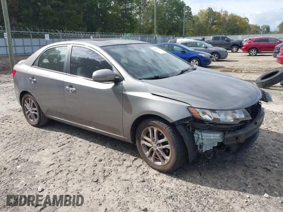 ✅ 2012 Kia Forte EX • VIN: KNAFU4A26C5597763 • Lot: 43357086. Listed on IAAI with 135,667 mi. Free auction sales archive from the USA and detailed vehicle history report at DreamBid. Image 1.