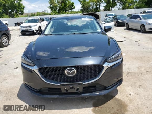 ✅ 2021 Mazda 6 Touring • VIN: JM1GL1VM3M1612829 • Лот: 63479445. Опубликован ранее на Copart с пробегом 66 601 миль. Бесплатный доступ к архиву аукционных продаж из США и подробный отчёт об истории автомобиля на DreamBid. Изображение 5.
