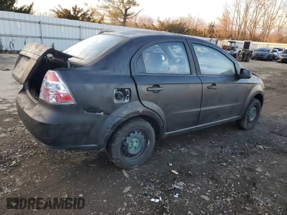 2009 Chevrolet Aveo 1LT z VIN KL1TD56E79B604381, wystawiony jako Copart lot #83262524 z przebiegiem Nie podano mil oraz Szkoda całkowita • Salvage title. Historia ofert i sprzedaży dostępna na DreamBid. Obrazek 3.