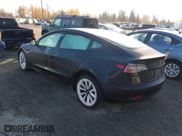 ✅ 2022 Tesla Model 3 Long Range • VIN: 5YJ3E1EBXNF132738 • Лот: 43654321. Опубликован ранее на IAAI с пробегом Не указан. Бесплатный доступ к архиву аукционных продаж из США и подробный отчёт об истории автомобиля на DreamBid. Изображение 3.