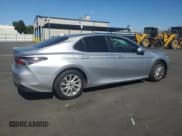 ✅ 2023 Toyota Camry LE • VIN: 4T1R11AKXPU820868 • Лот: 82416655. Опубликован ранее на Copart с пробегом 57 119 миль. Бесплатный доступ к архиву аукционных продаж из США и подробный отчёт об истории автомобиля на DreamBid. Изображение 3.