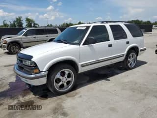 ✅ 1999 Chevrolet Blazer LS • VIN: 1GNCS13W6X2217684 • Lot: 63035645. Wystawiony na Copart z przebiegiem 114 567 mil. Bezpłatny archiwum sprzedaży aukcyjnych z USA i szczegółowy raport historii pojazdu na DreamBid. Zdjęcie 1.
