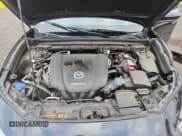 ✅ 2021 Mazda CX-30 Premium • VIN: 3MVDMBDM0MM218214 • Lot: 92629905. Listed on Copart with 75,604 mi. Free auction sales archive from the USA and detailed vehicle history report at DreamBid. Image 12.